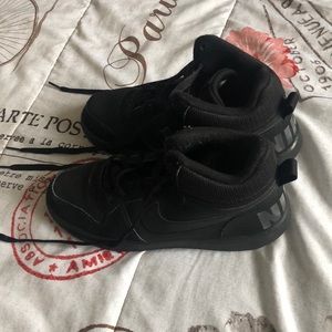 Black Nikes high top in US size 5.5y